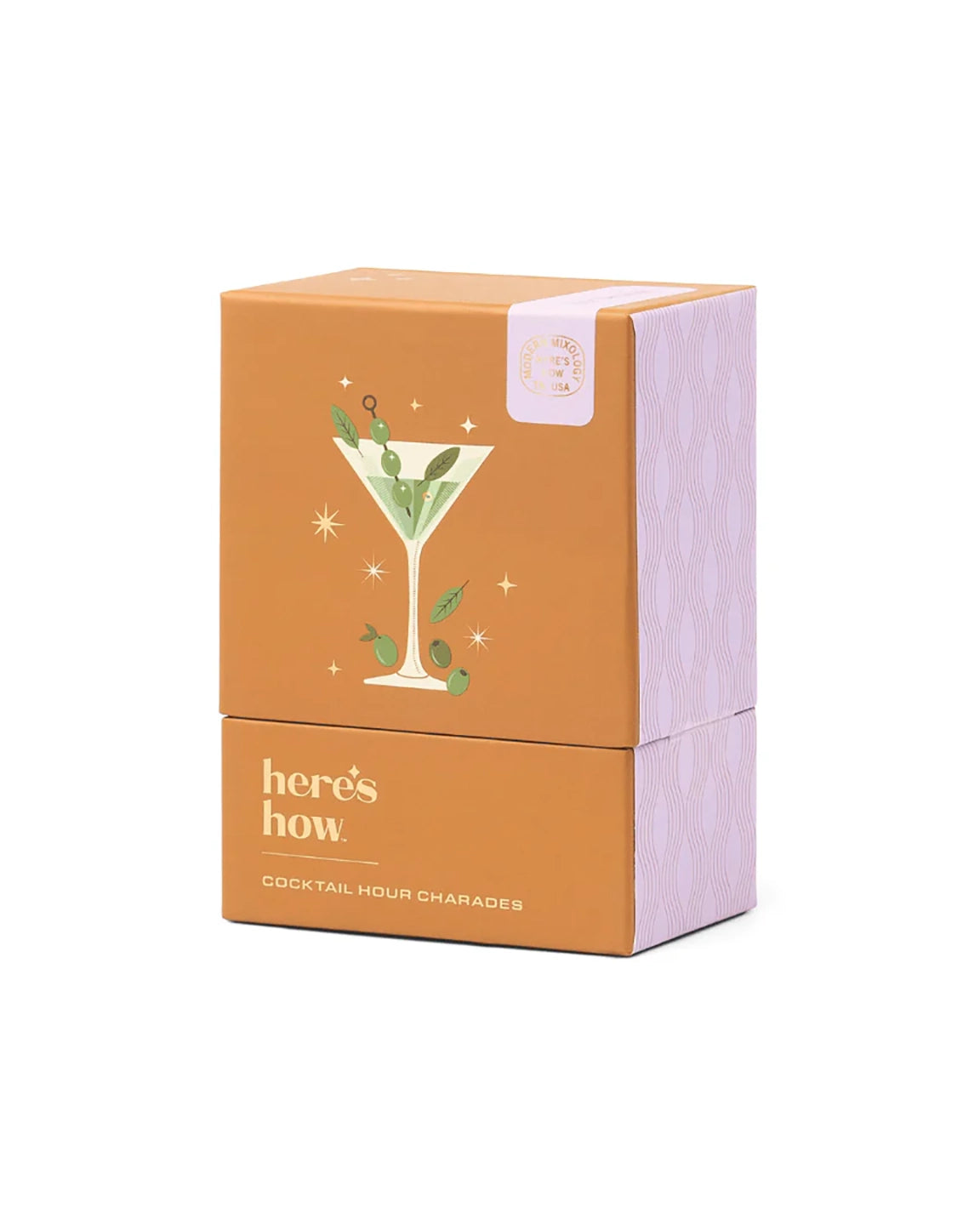 Orange packaging box with cocktail illustration and 'here's how' text on a white background