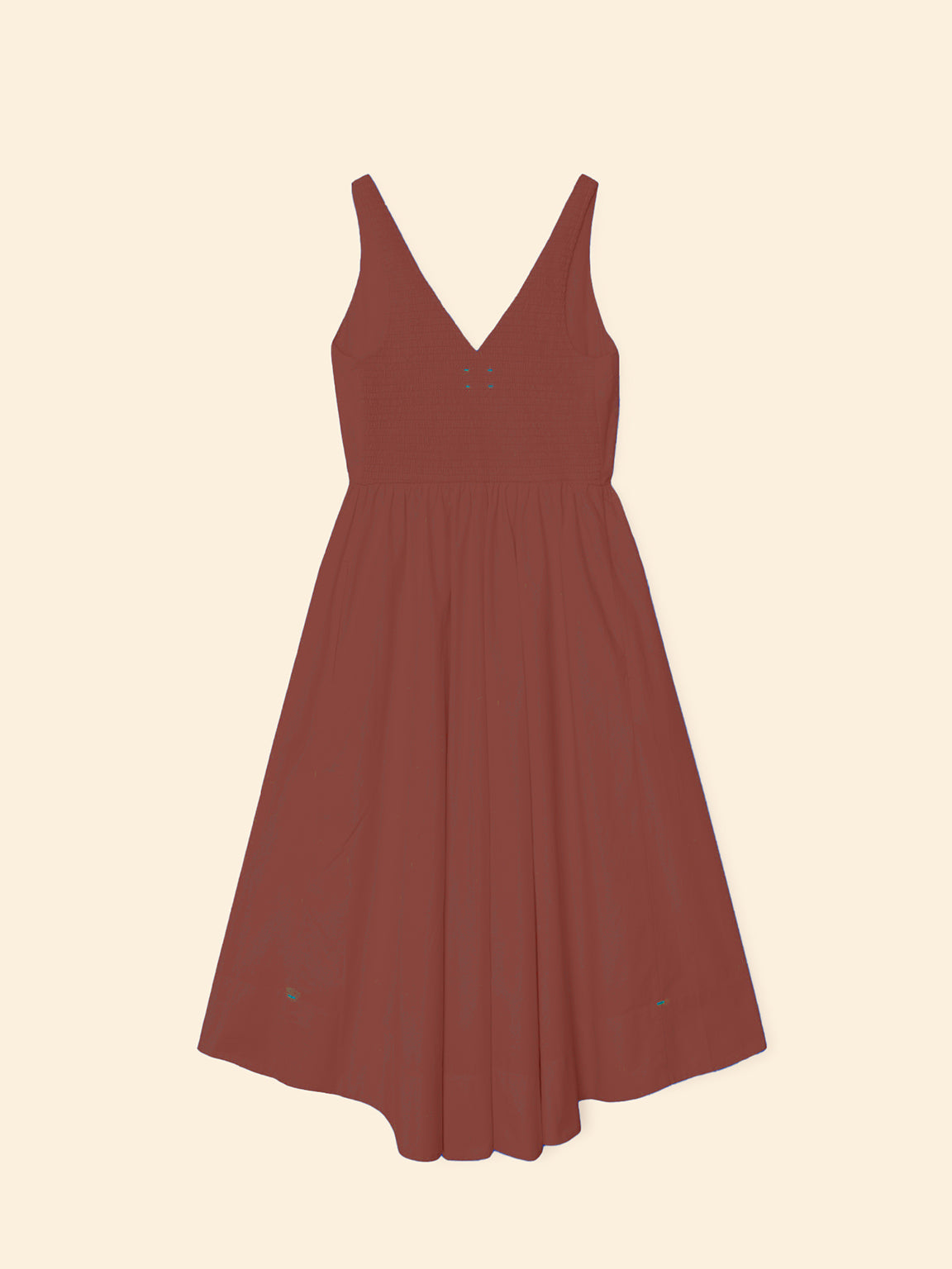 Red dress on a beige background