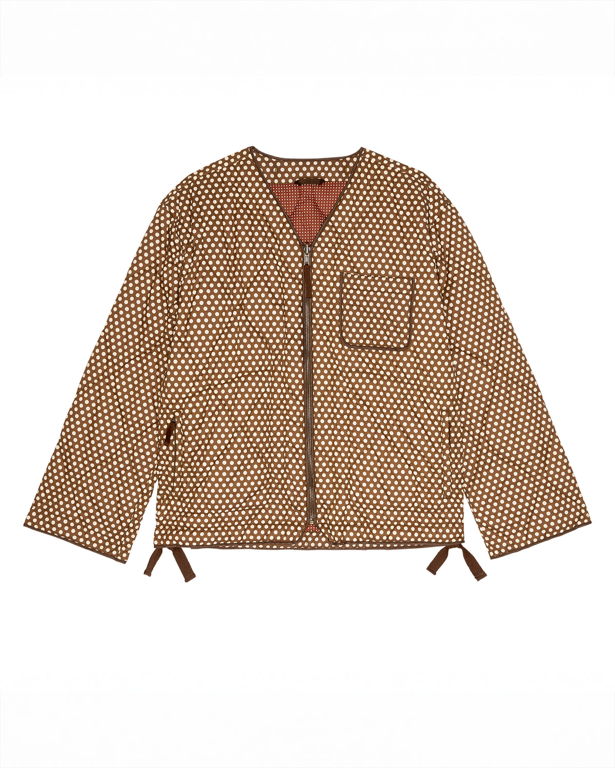 The Great. The Creek Reversible Zip Liner in Chocolate Dot & Maroon Dot