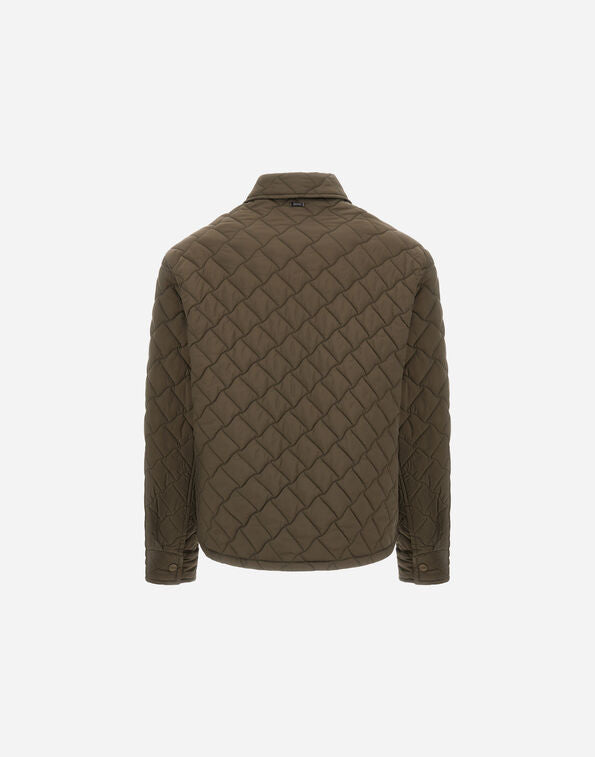 Quilted jacket with diamond pattern on a white background