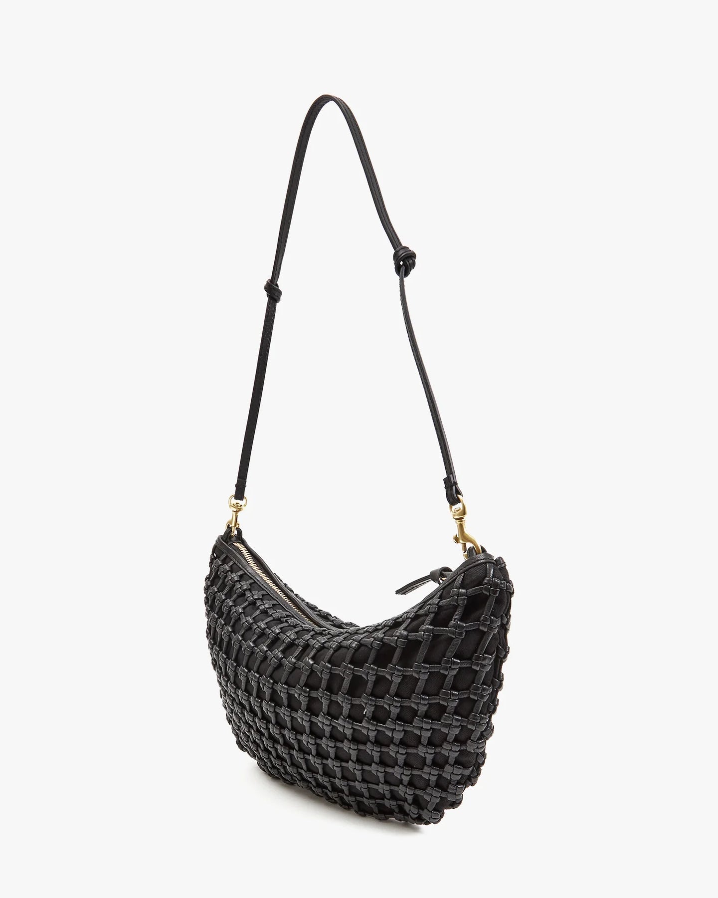 Black woven handbag with a strap on a white background