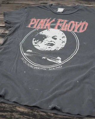 Pink Floyd t-shirt on a wooden surface