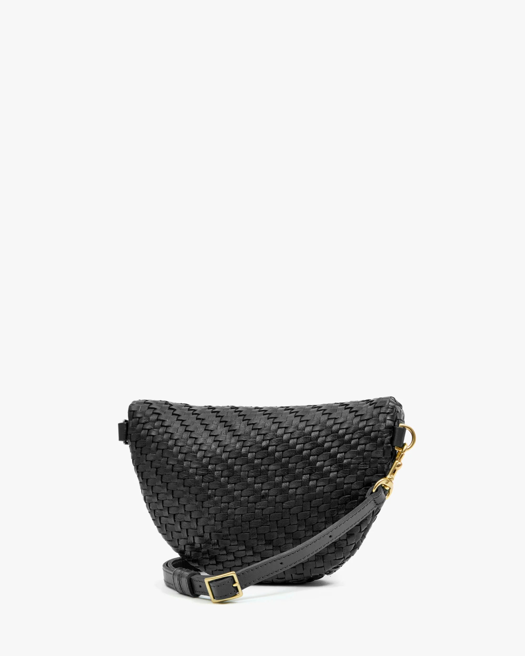 Black woven handbag with gold accents on a white background