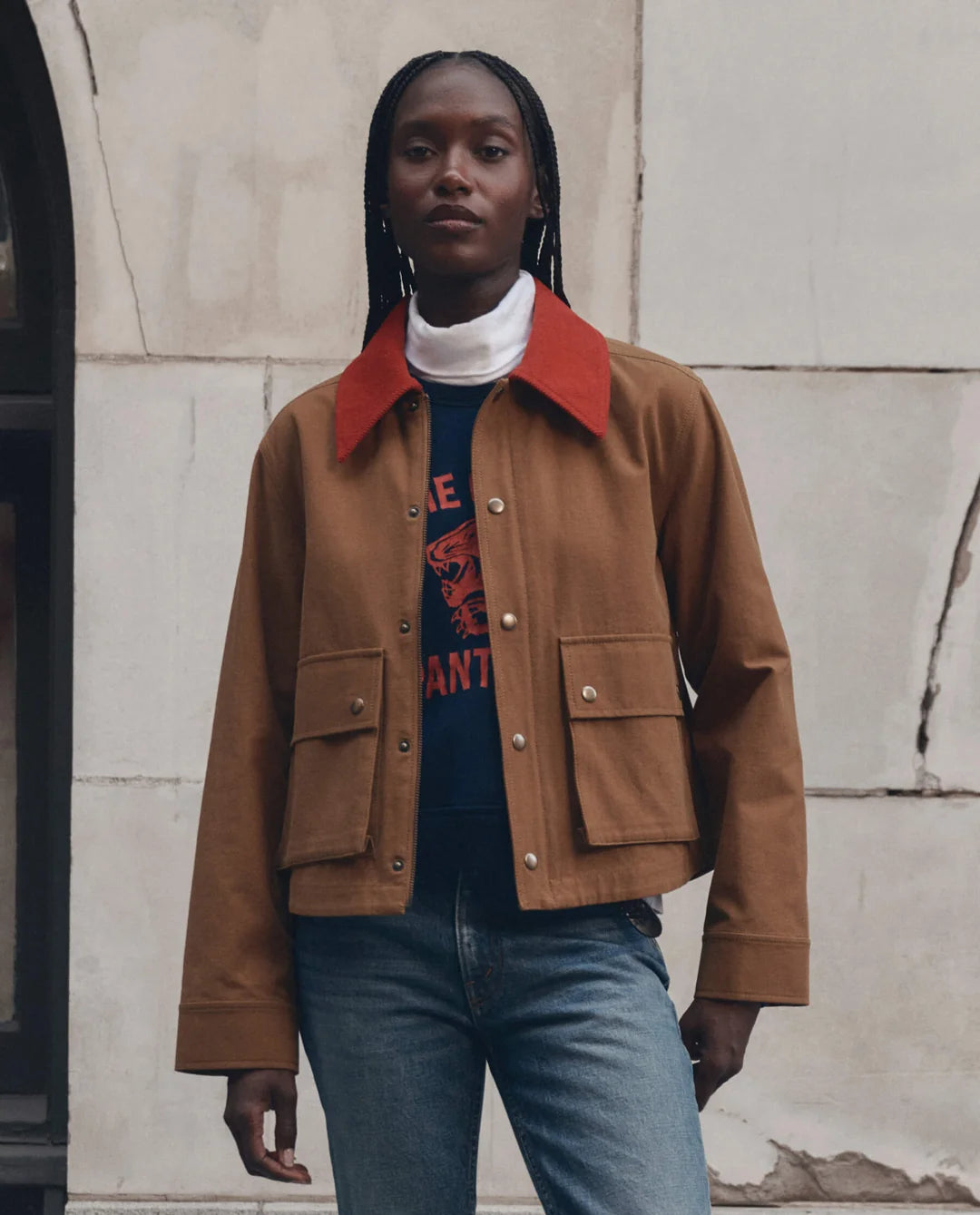 The Great. The Swingy Jacket in Rust with Bright Red