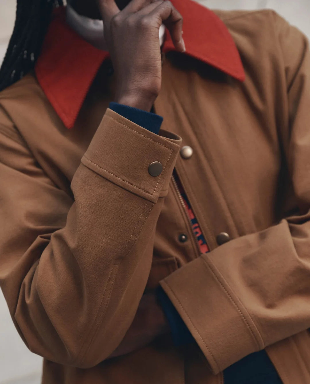 The Great. The Swingy Jacket in Rust with Bright Red