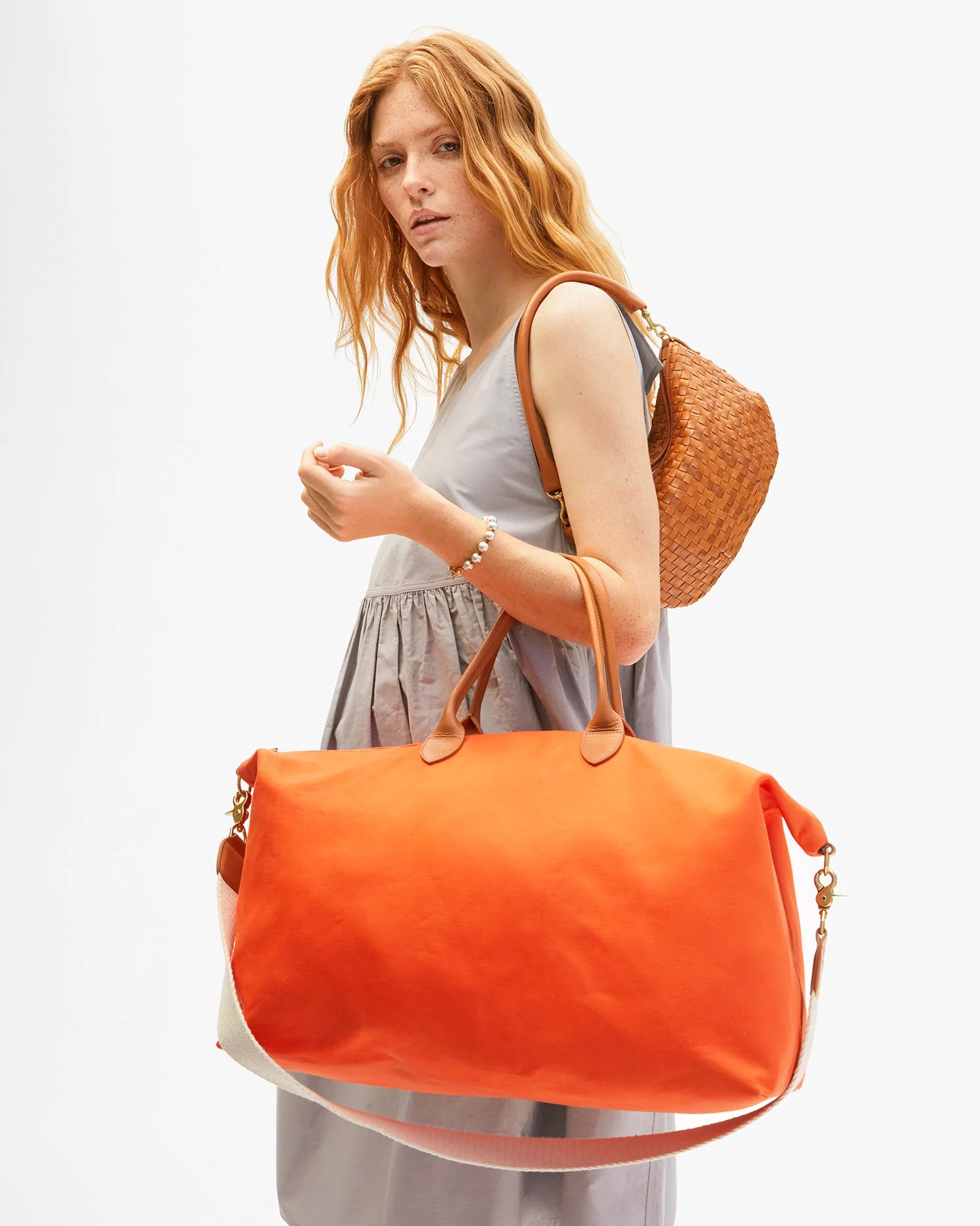 Clare V. Weekender in Tangerine Canvas