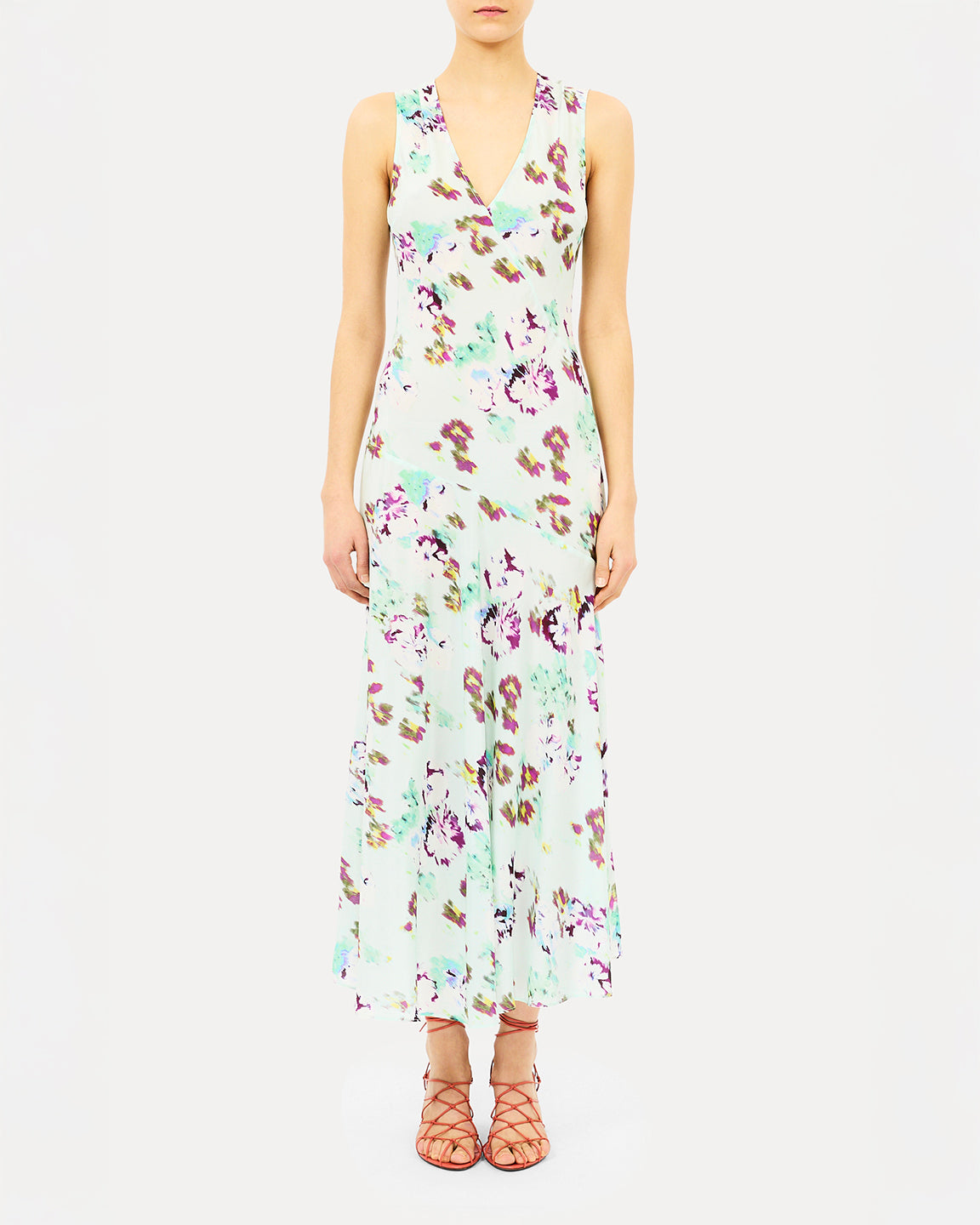 Woman wearing a floral dress on a white background