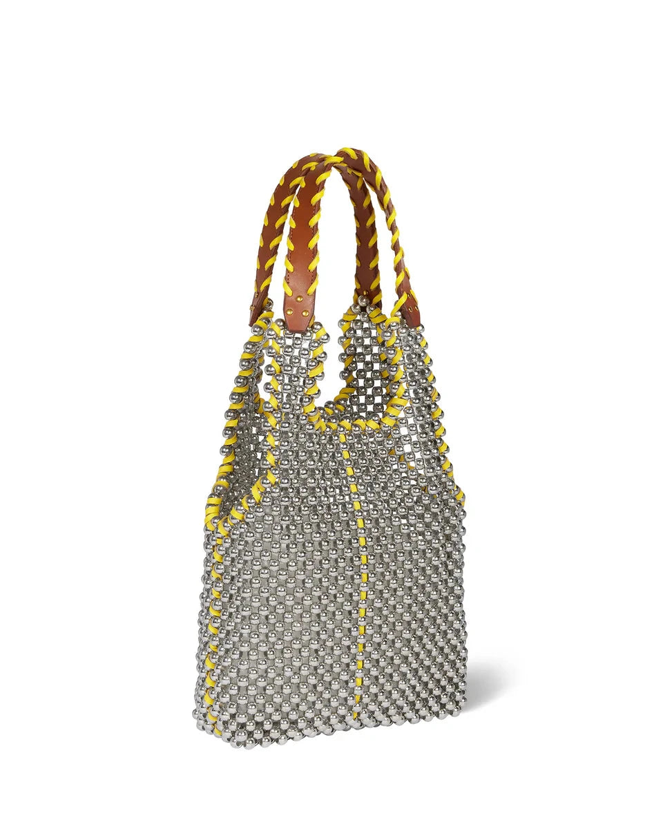Silver beaded bag with yellow accents on a white background