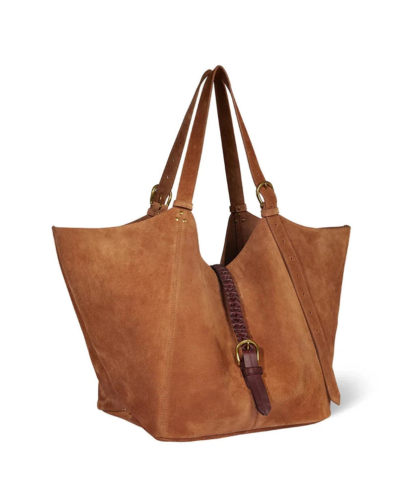 Brown leather tote bag with a strap on a white background