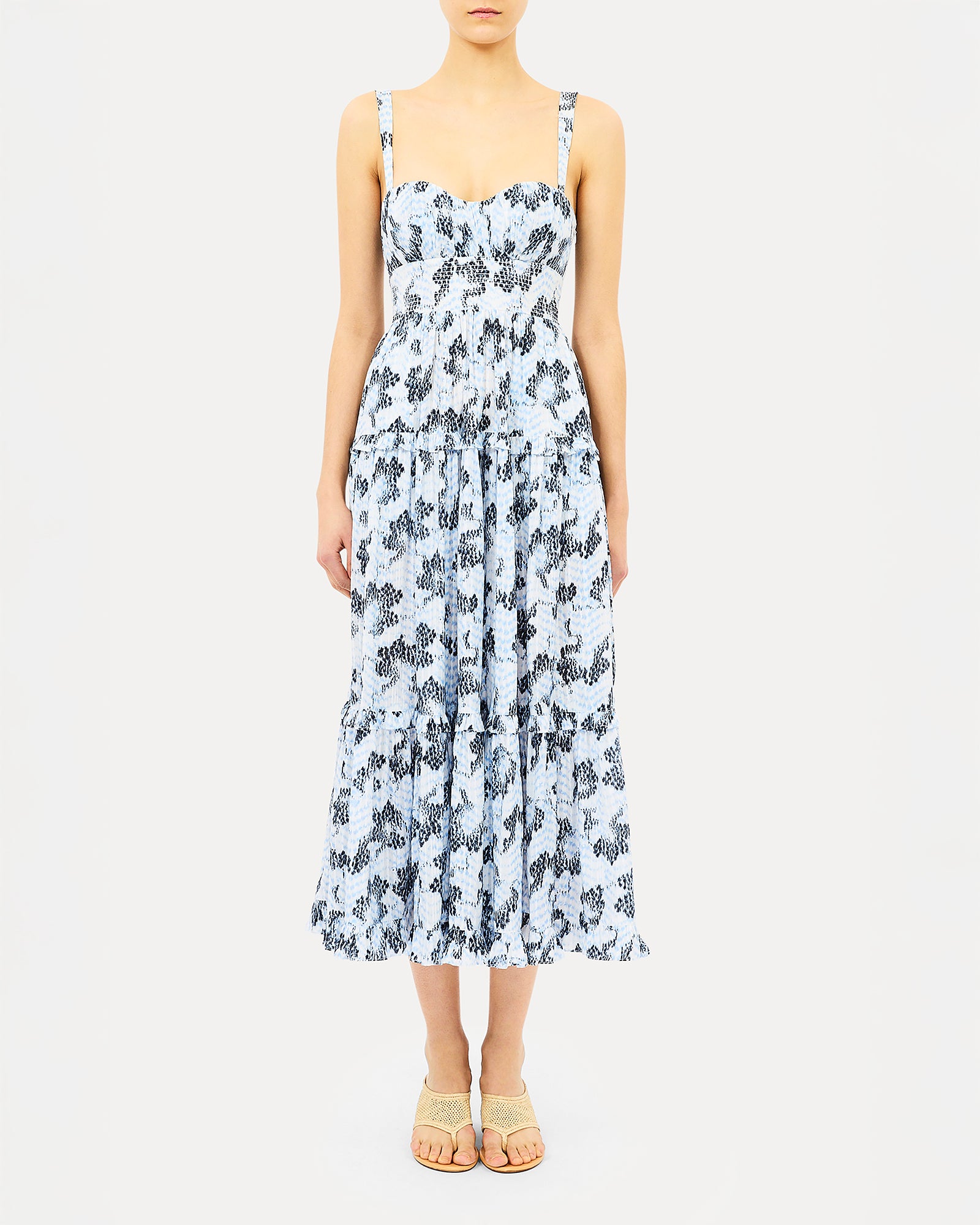 Woman wearing a floral dress on a white background