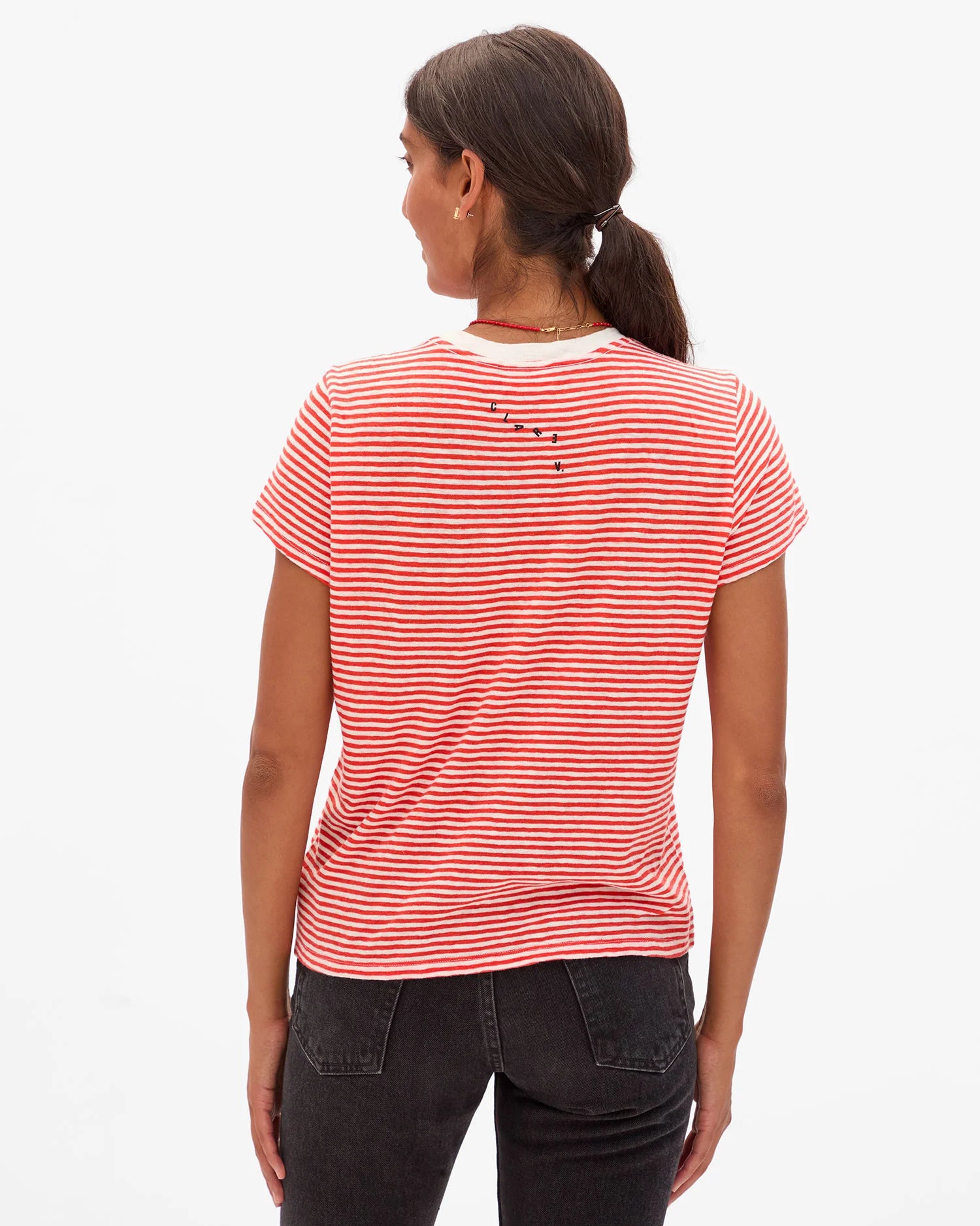 Person wearing a red and white striped shirt on a white background