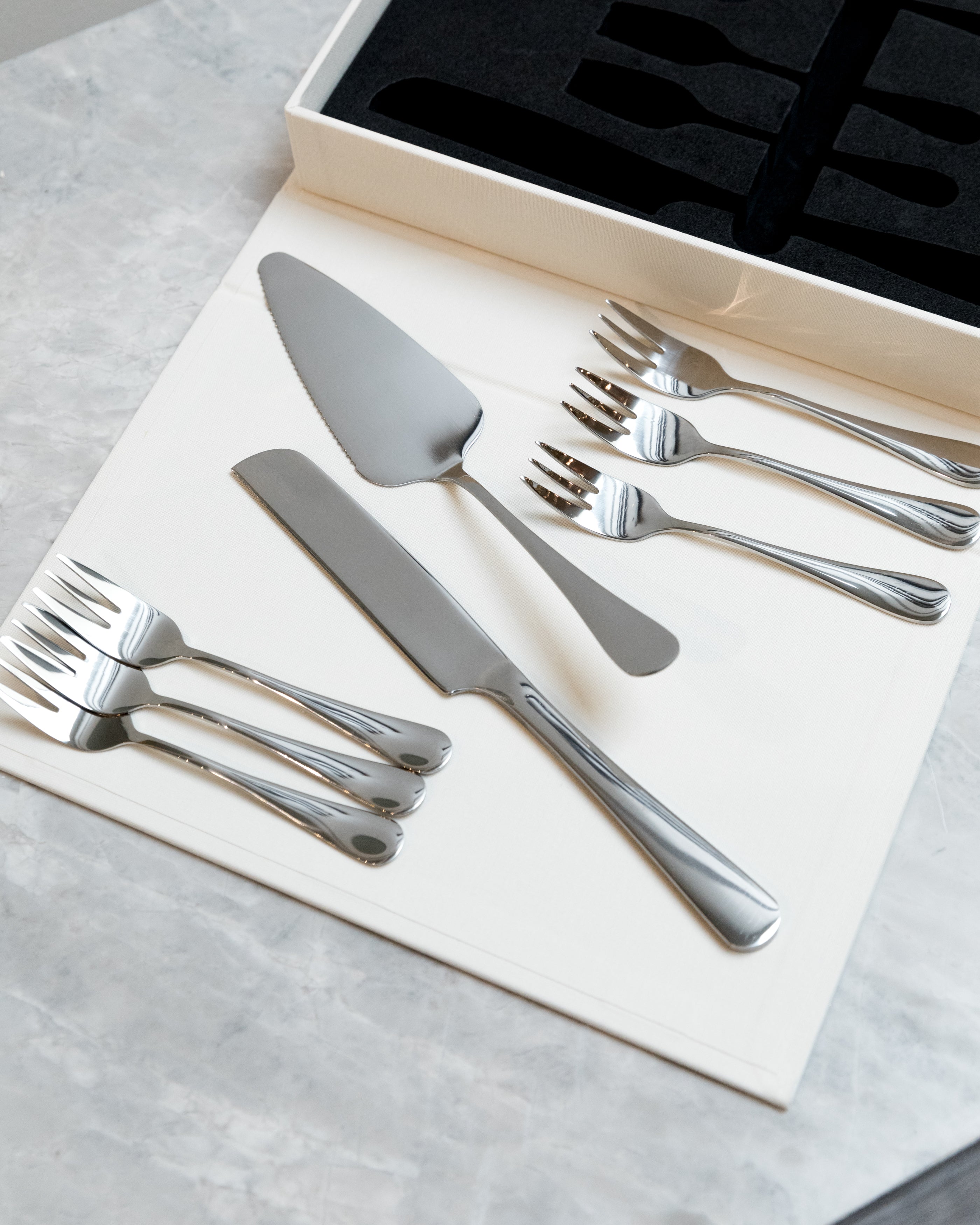 stainless steel spatula and knife and 6 spoons