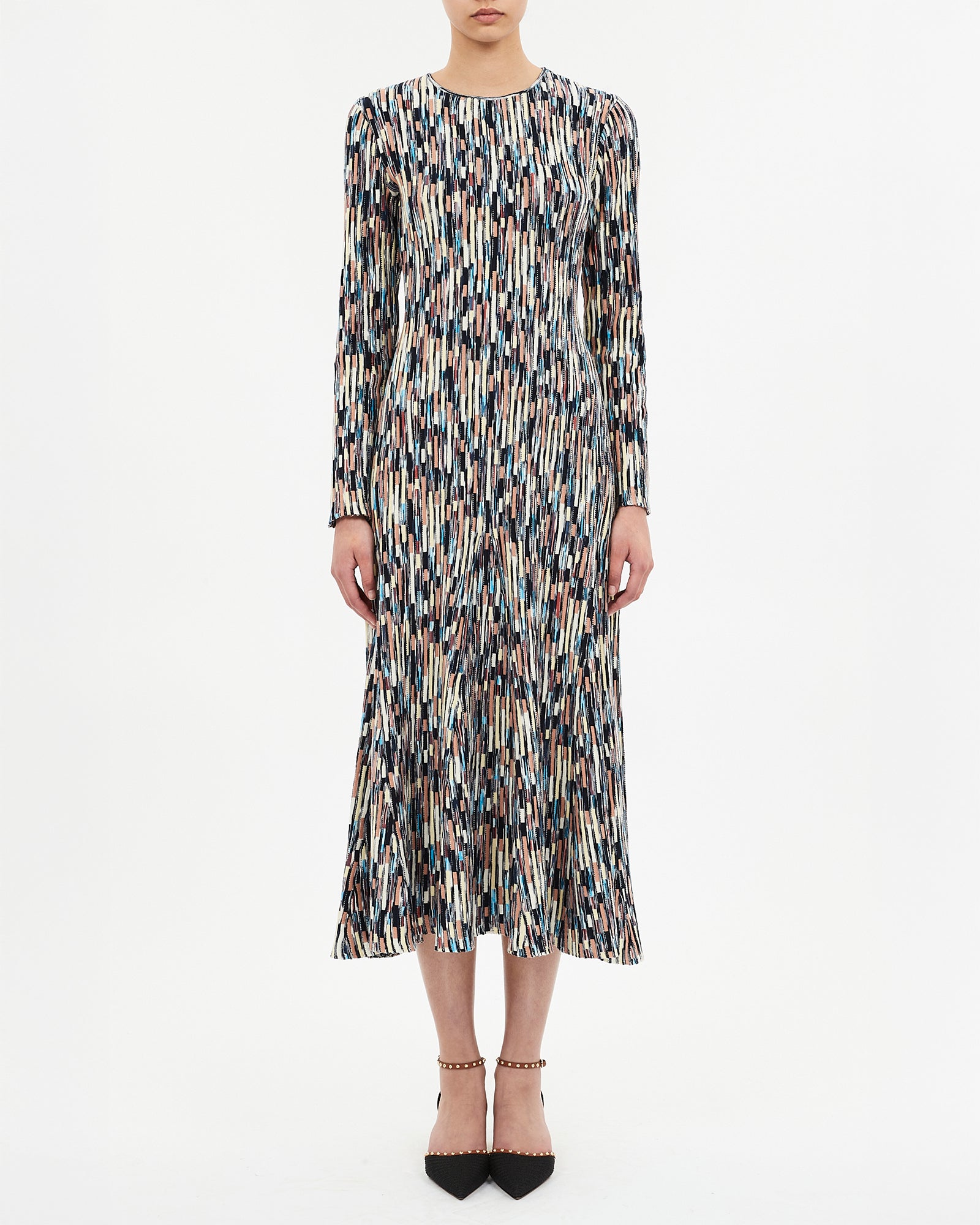 Long-sleeve dress with a multicolor abstract pattern on a white background