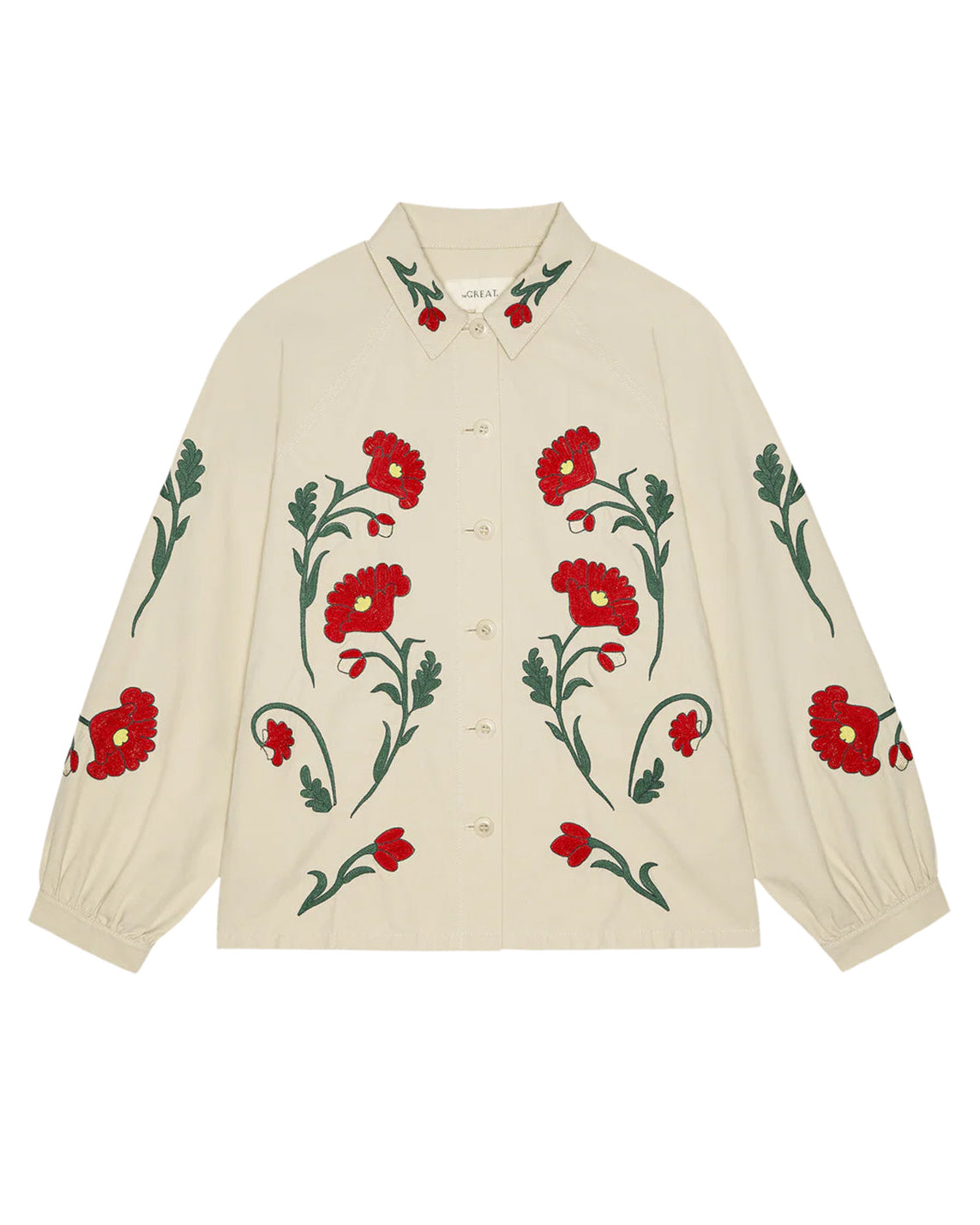 Beige sweater with red floral embroidery on a white background
