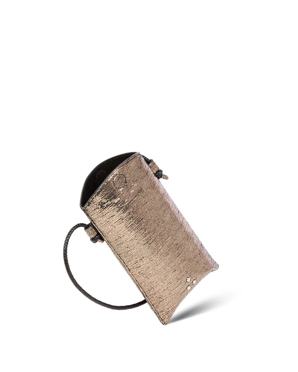 Metallic clutch bag on a white background