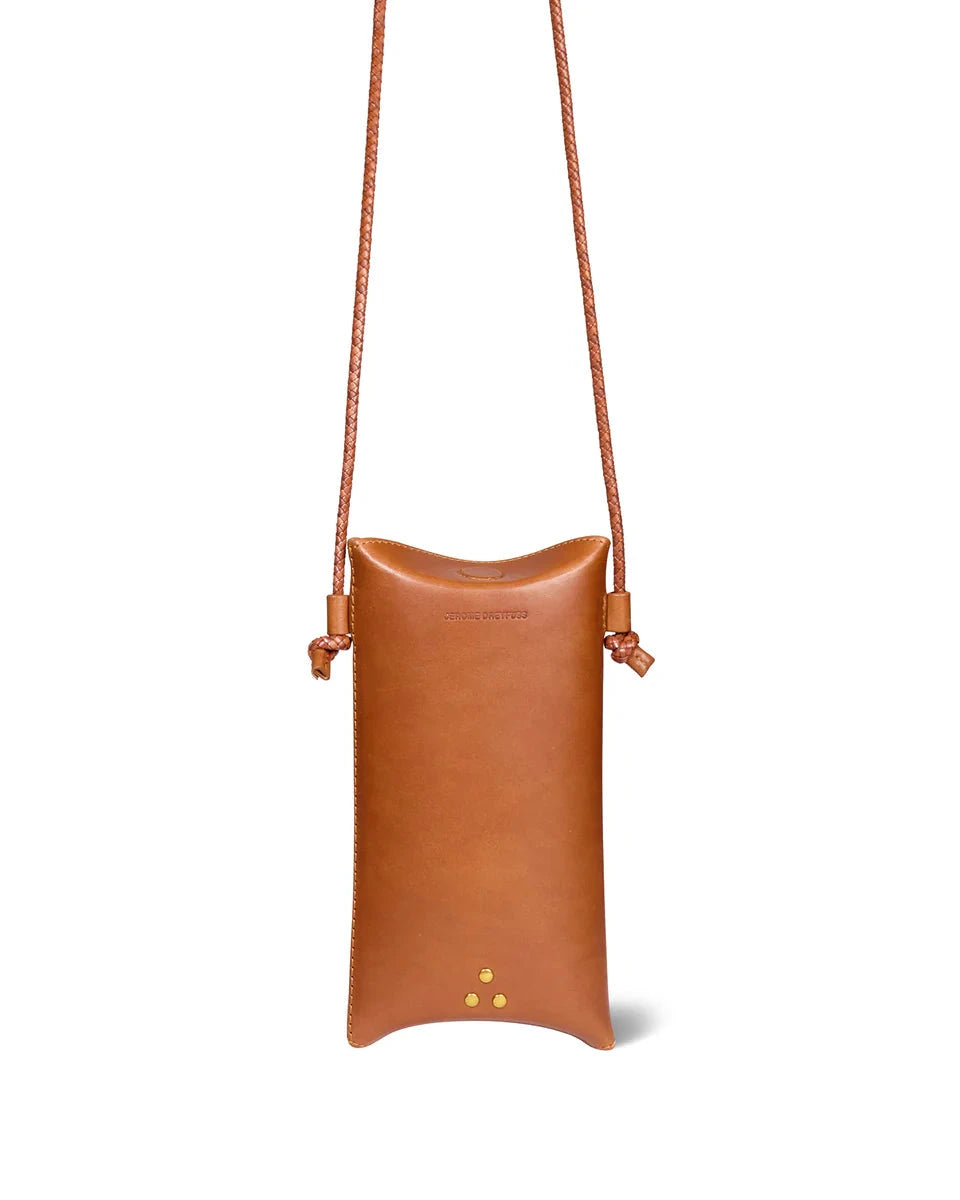 Brown leather pouch with a strap on a white background