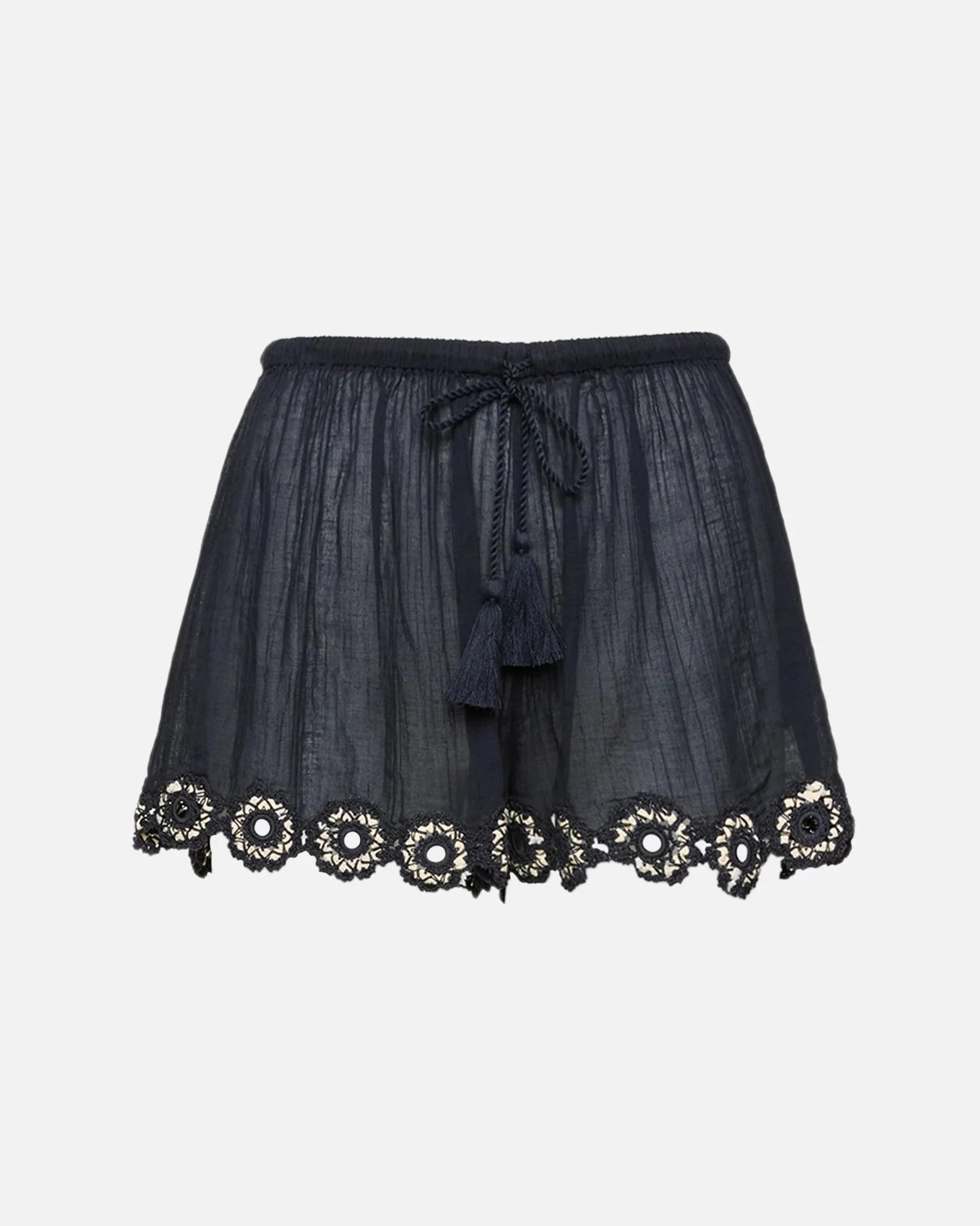 Black lace shorts with floral embellishments on a light gray background