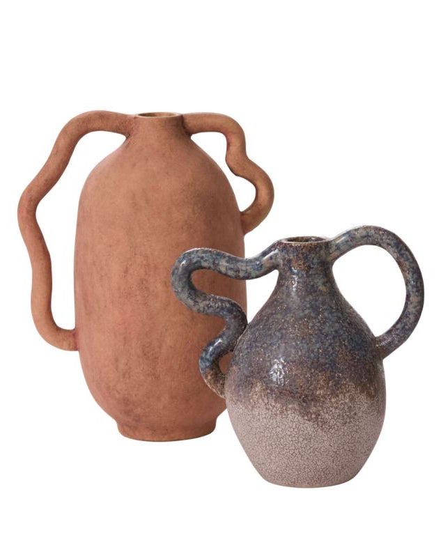 Two ceramic vases with handles on a white background