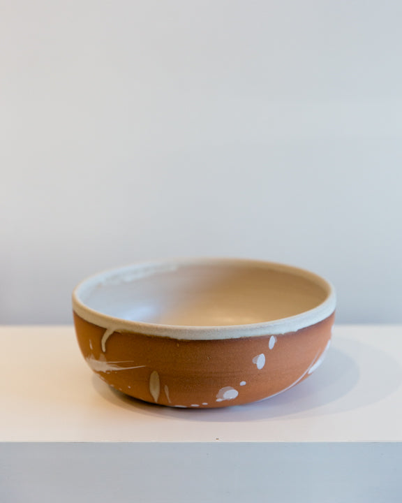 Earl Ceramics Pasta Bowl in White on Terracotta